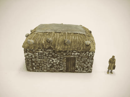 1:76  STONE CROFT WITH GRASS ROOF AND NET.